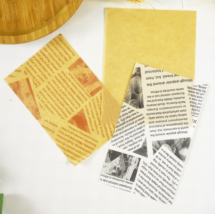 กระดาษเคลือบกันน้ำสำหรับห่อขนม กระดาษคั่นเค้กโรลแบบชิ้น (แพ็ค 500 ชิ้น)