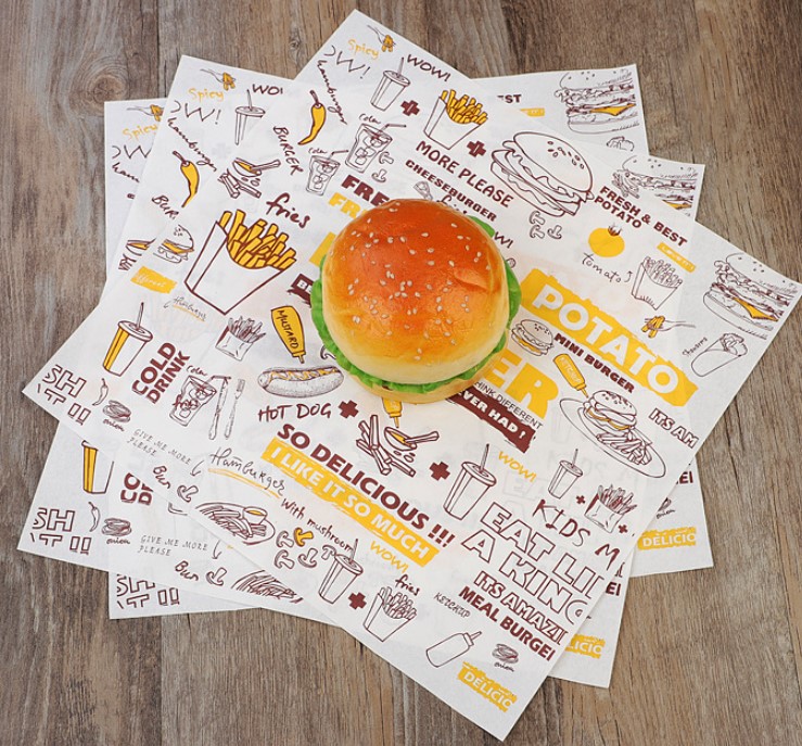 กระดาษเคลือบกันไขมัน (grease-proof paper) พิมพ์ลาย สำหรับห่อแฮมเบอร์เกอร์ (แพ็ค 100 แผ่น)