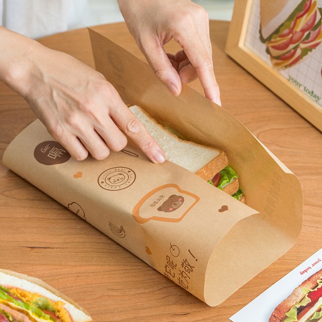 กระดาษไขรองอาหาร (Greaseproof paper) เคลือบกันน้ำ-น้ำมัน ขนาด 28x38 ซม. แบบแพ็ค 50 ชิ้น