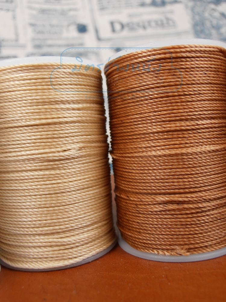 ด้ายเทียนนอก แบบเกลียวถักกลม 0.65 มิล