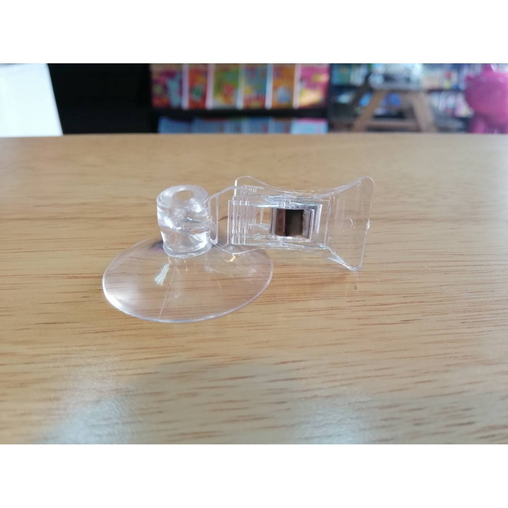 ตัวหนีบป้าย POP แบบฐานจุ๊บดูดกระจก (สีใส) ฐาน 4 ซม. สูง 5.5 ซม. ( ราคา 5 ชิ้น)