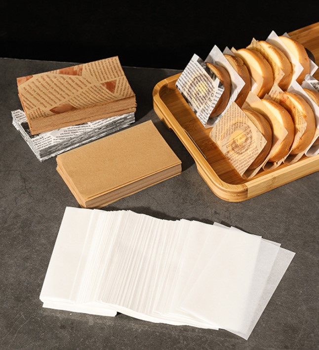 กระดาษเคลือบกันน้ำสำหรับห่อขนม กระดาษคั่นเค้กโรลแบบชิ้น (แพ็ค 500 ชิ้น)