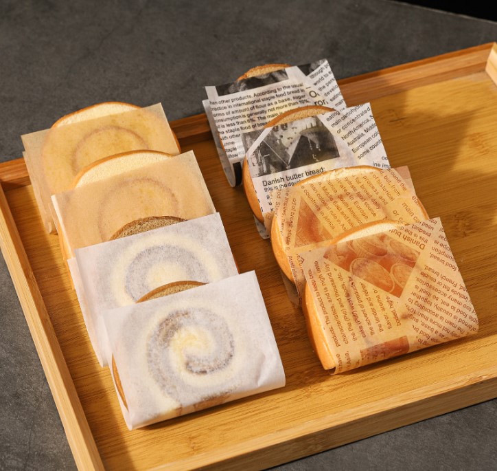 กระดาษเคลือบกันน้ำสำหรับห่อขนม กระดาษคั่นเค้กโรลแบบชิ้น (แพ็ค 500 ชิ้น)