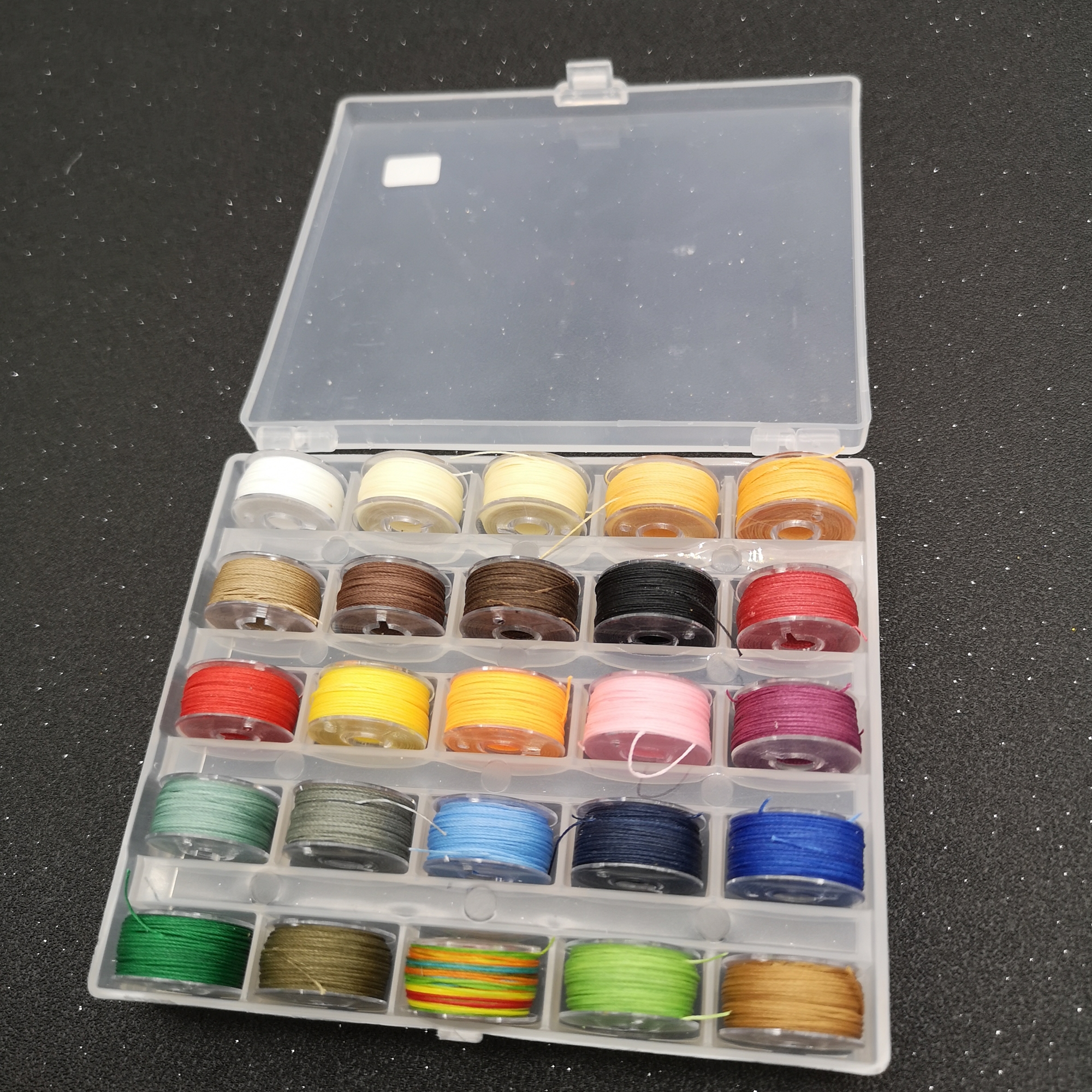 ชุดด้ายกลมเคลือบแวกซ ม้วนเล็ก ขายยกกล่อง 25 สี สุดคุ้ม